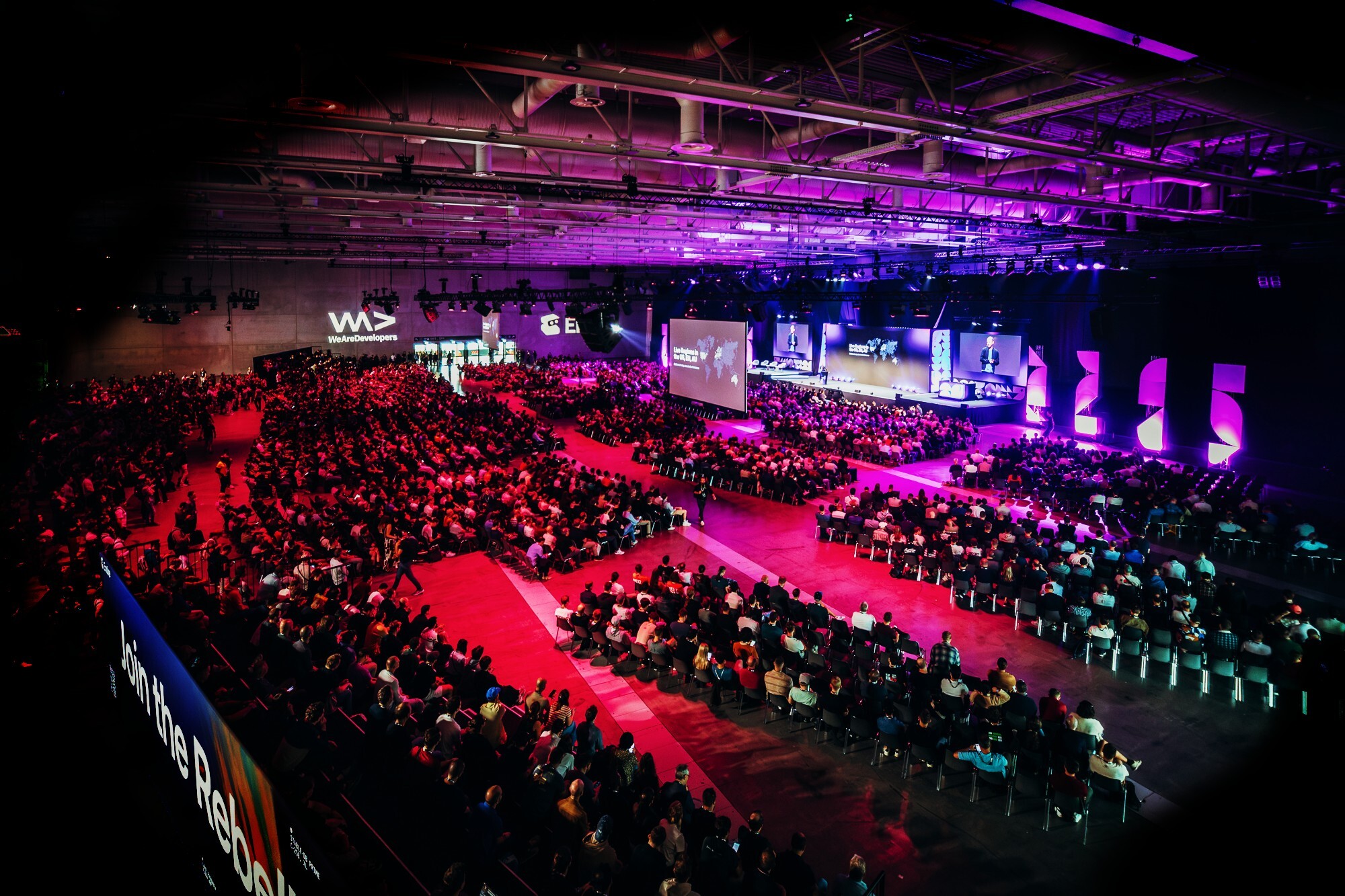 Thousands of attendees fill the WeAreDevelopers World Congress auditorium in Berlin.